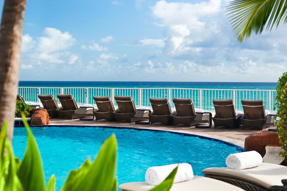 Swim at beachfront pools and dine in style on a family-friendly vacation.