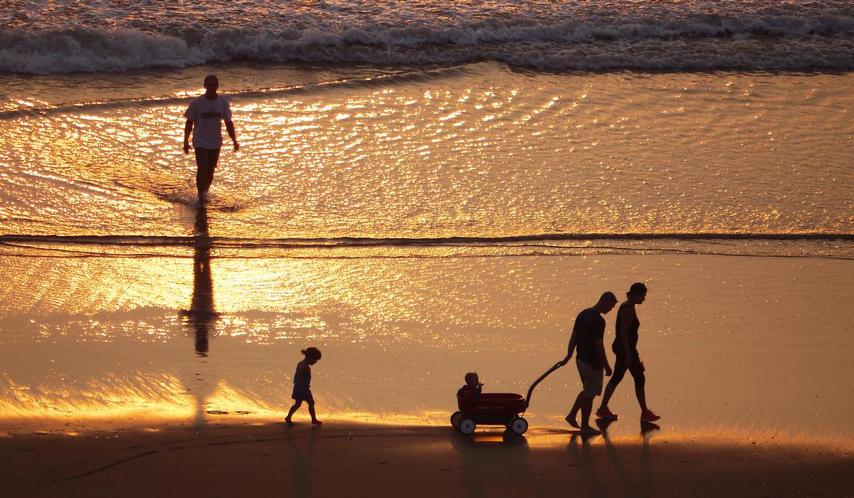 Beach glowing orange at sunset