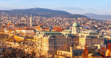 View of Buda Castle from Gellert Hill on sunny evening, Budapest, Hungary, Europe, UNESCO World Heritage Site