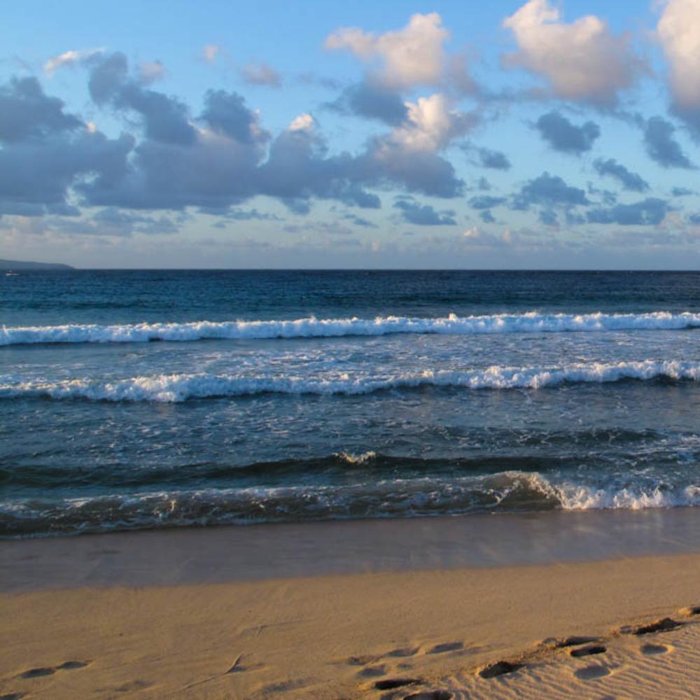 I took this photo just as the soft sand was turning golden around sunset