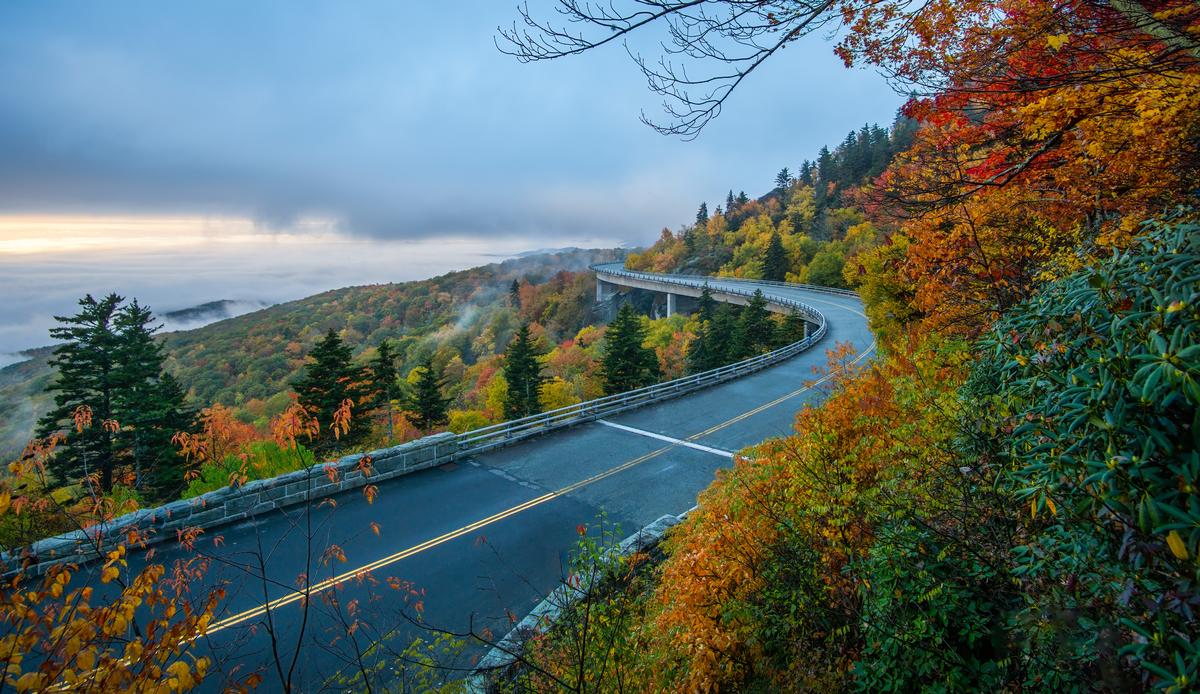 Beautiful sunrise colors at the Linn Cove Viaduct in Autumn - Blue Ridge Parkway