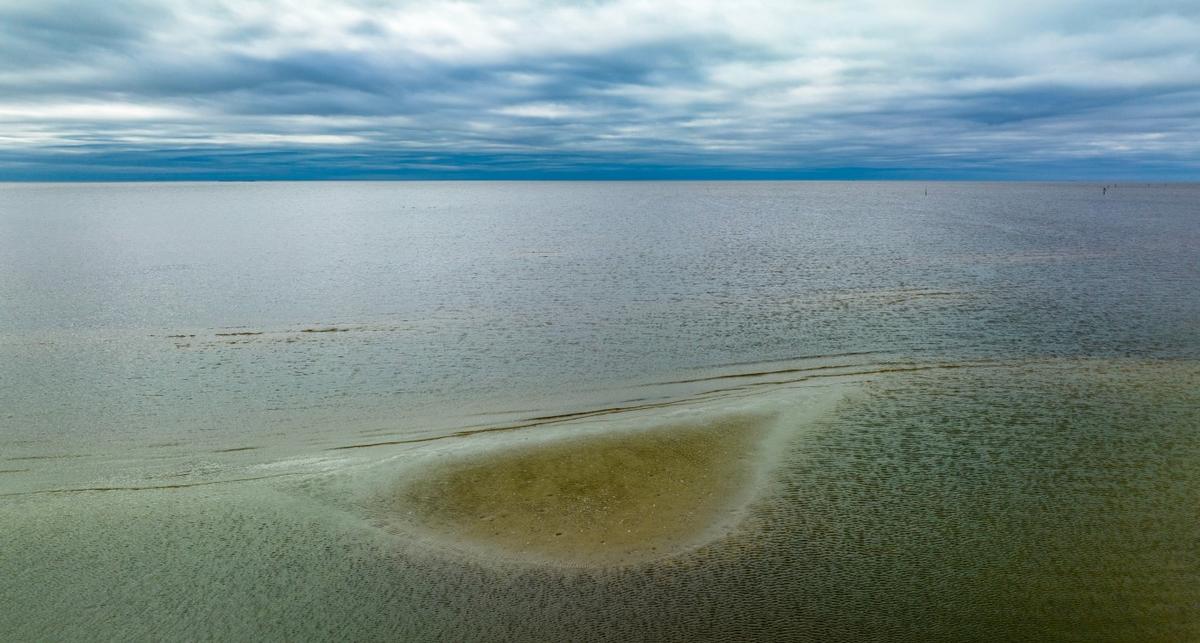 Relax on expansive sandy shores and enjoy stunning sunsets.