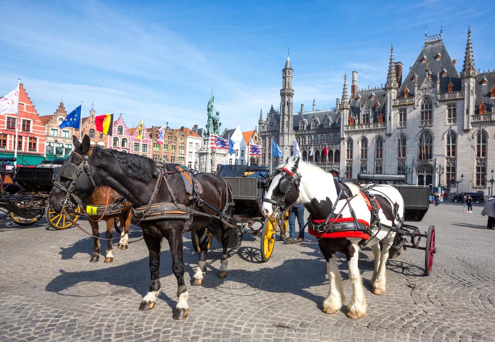 Clip-Clop Through Medieval Streets with Bruges by Horse-Drawn Carriage