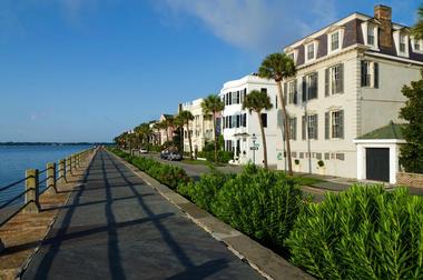 Walking past Historic East Battery in morning light, Charleston, SC
