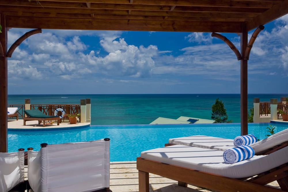 Bask in Romantic Sunsets and Secluded Cove Bliss at Calabash Cove Resort & Spa