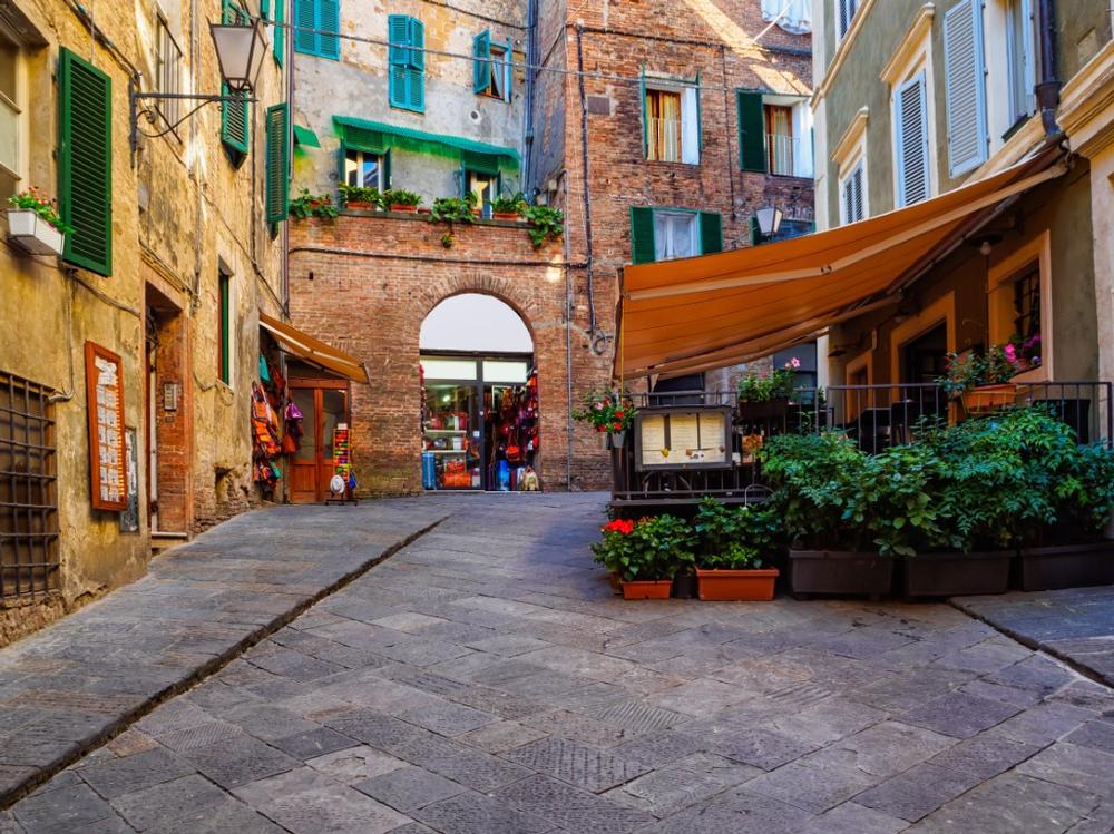 Wander Cobblestone Time Capsules in the UNESCO-listed Historic Centre