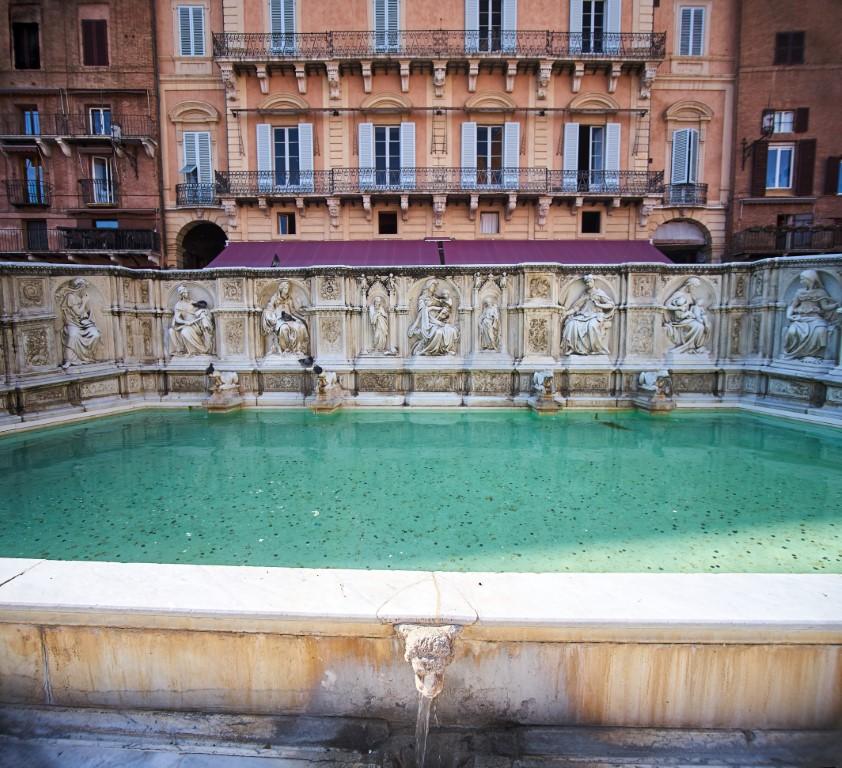 Pause at the Ornate Public Fountain - Fonte Gaia’s Symbolic Splendor