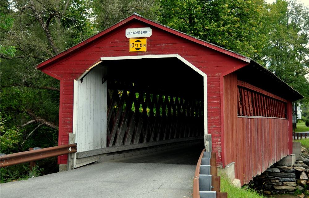 Stroll or Snap Photos at the Picturesque Silk Covered Bridge