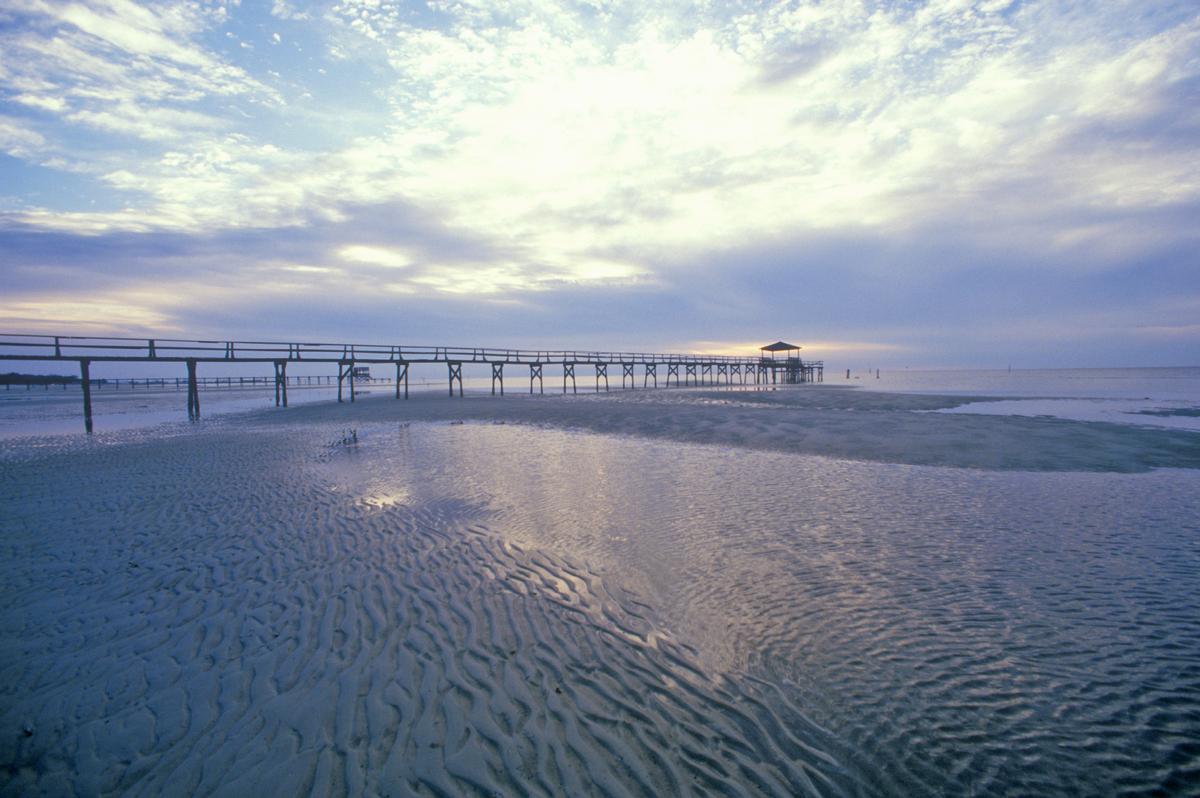 Pier at sunrise over the Gulf of Mexico, Biloxi, MS