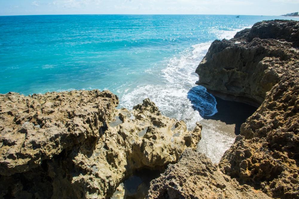 See waves crash against limestone and walk on nature trails during spring.