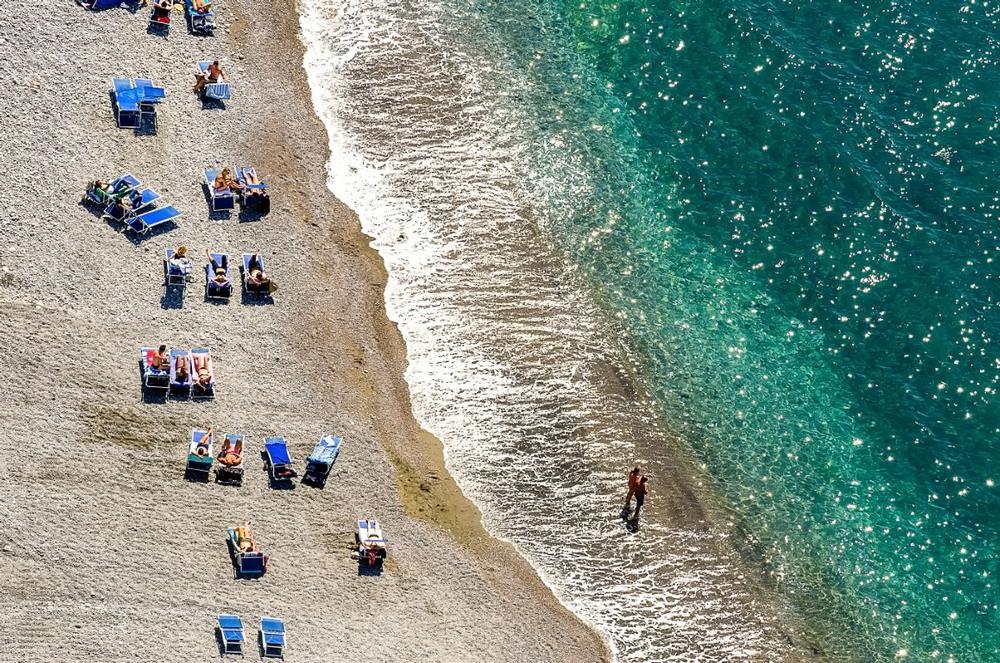 Swim with Locals and Serenity at Marina di Puolo