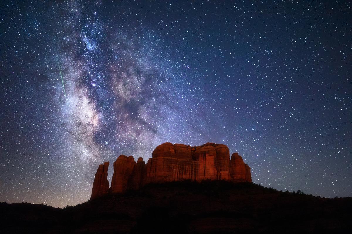 Staring in awe at the Milky Way above Cathedral Rock in Sedona, Arizona