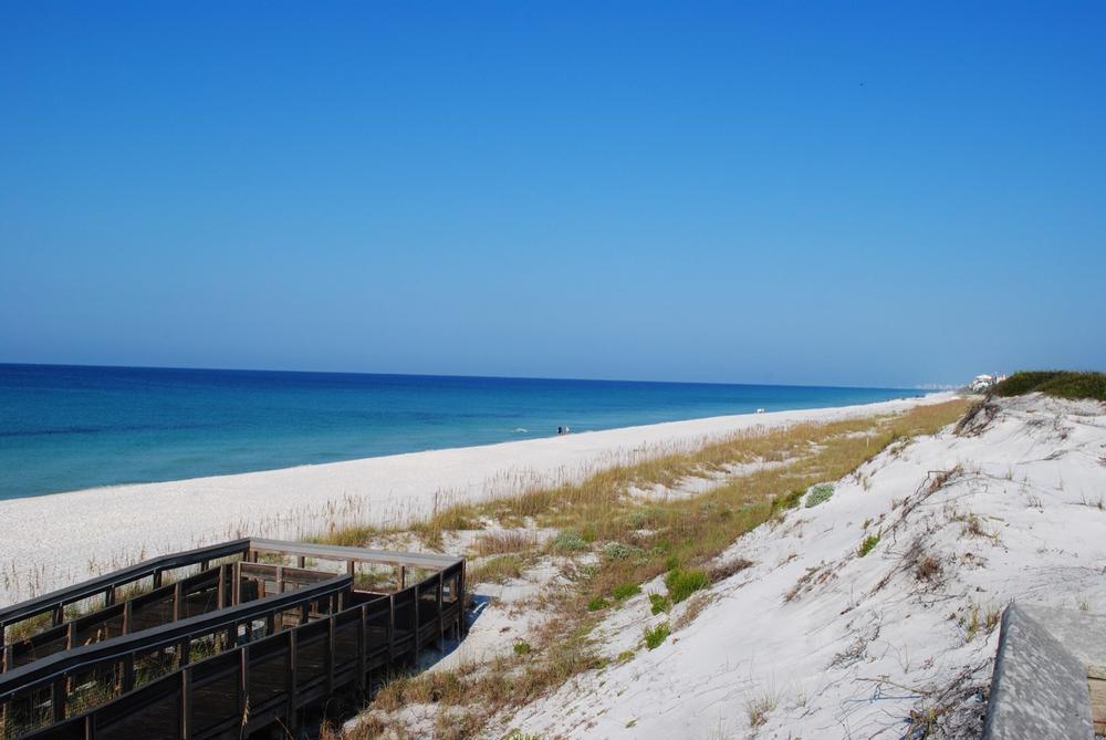 Explore exciting hiking trails and admire scenic dune lakes and pine forests.