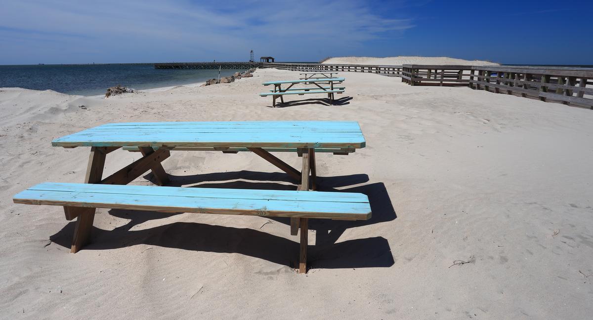 Walk along sandy shores and enjoy charming small-town vibes.
