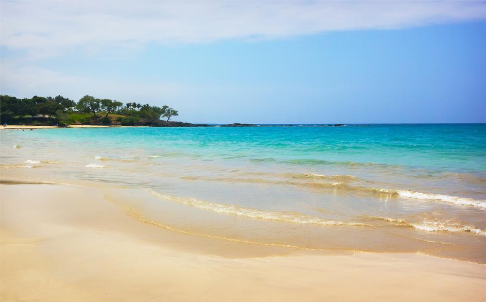 Swim in crystal waters and sunbathe on soft sand during a perfect summer trip.