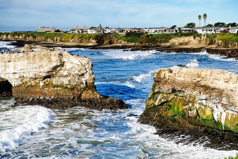 Walk along the boardwalk and surf ocean waves on a fun summer trip.