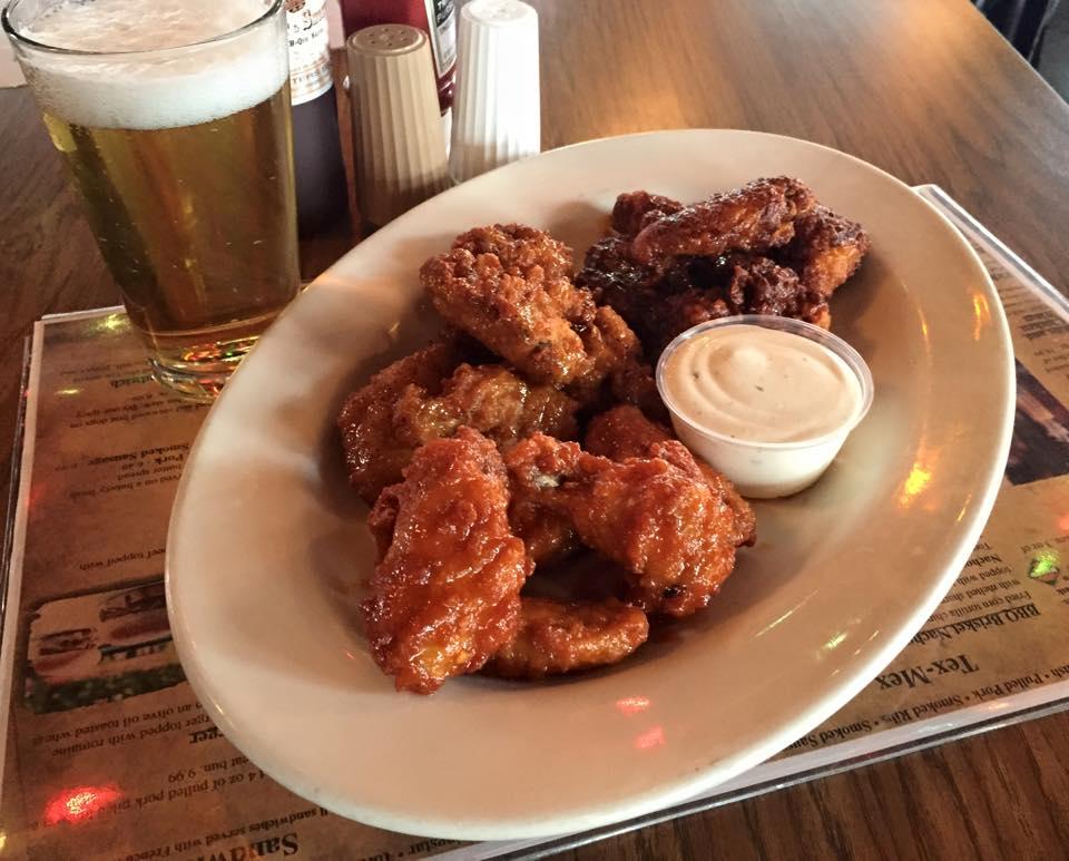 Decades of smoky tradition with all the fixins’—from ribs to banana pudding