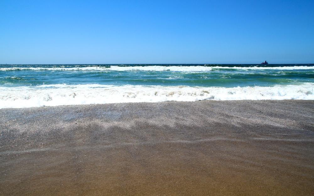 Surf the waves and enjoy a laid-back beach vibe. 