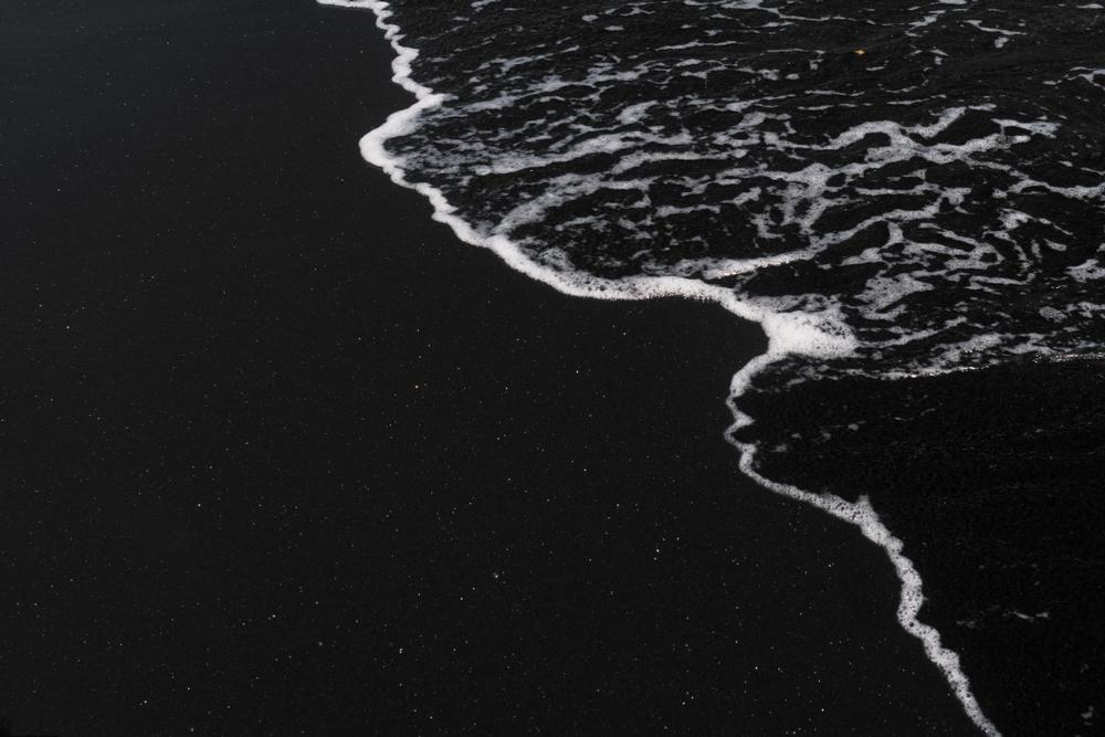 Marvel at Volcanic Beauty on Black Sand Beach