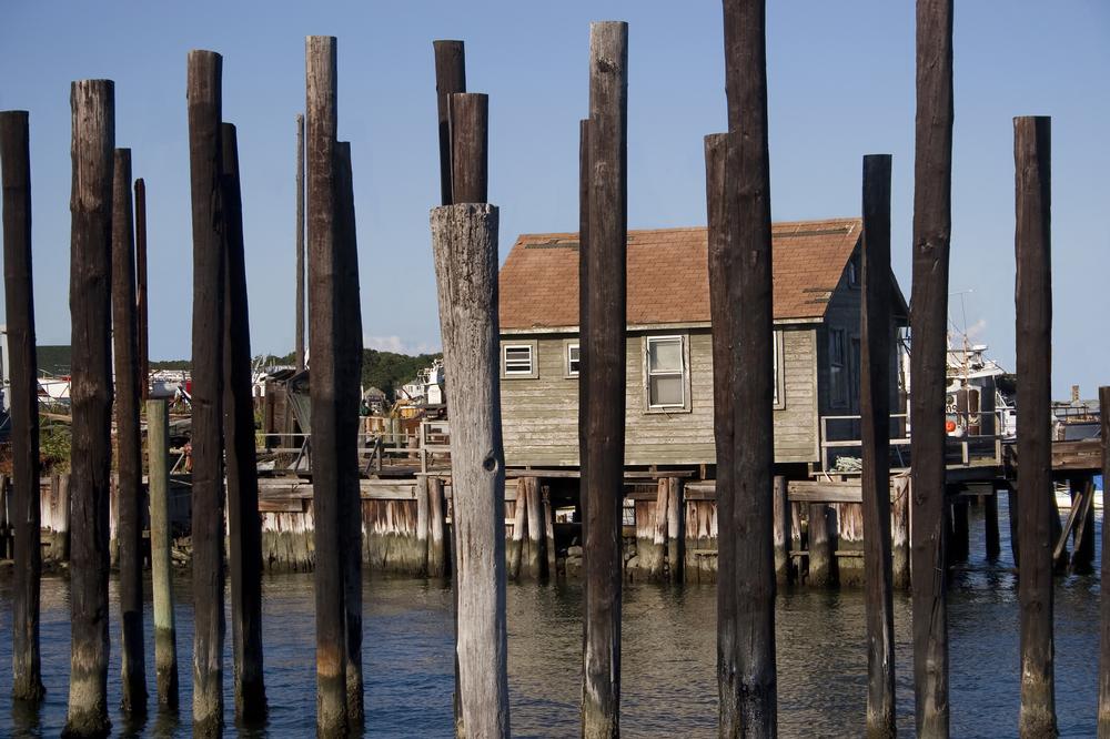 Visit charming shops and admire scenic harbor views.