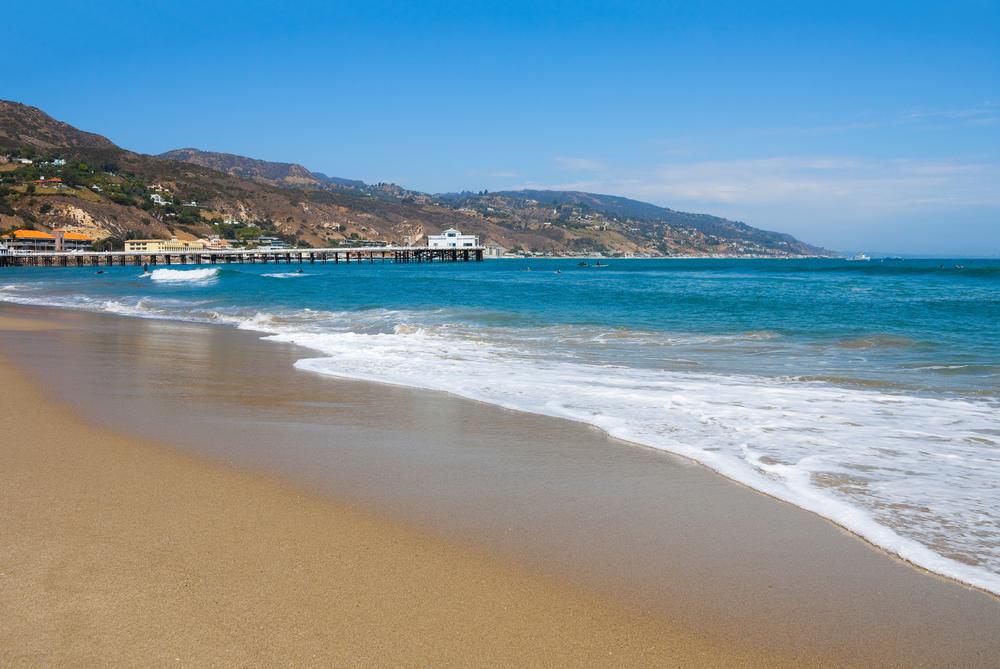 Birdwatch and enjoy surfing in scenic waters.