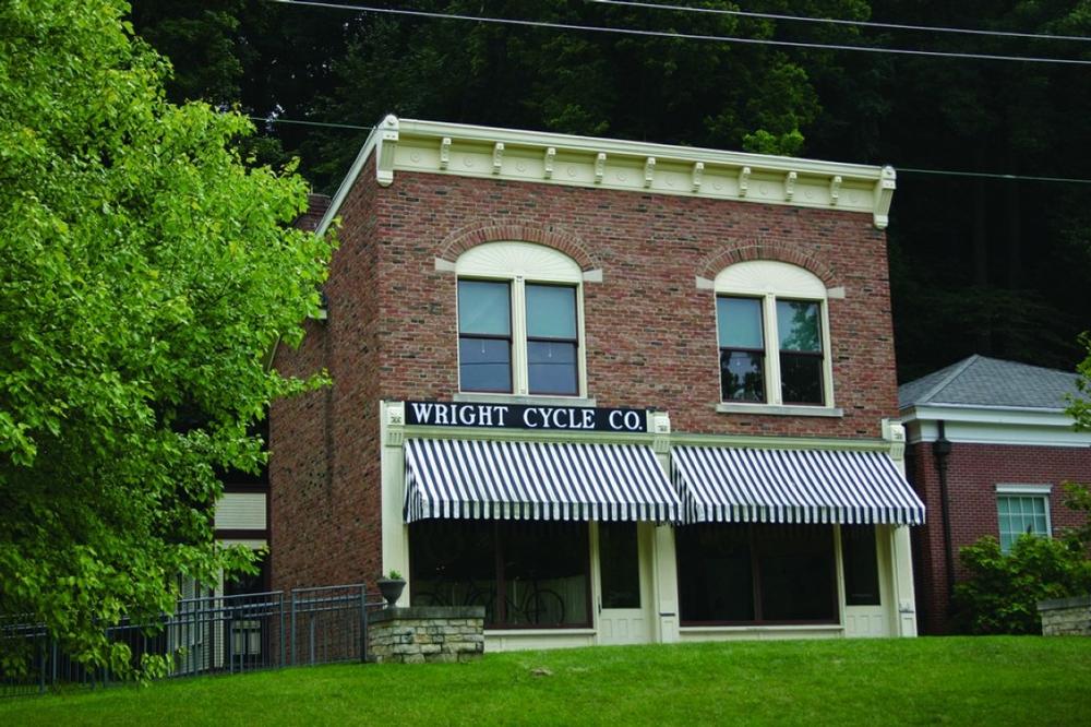 Visit vintage exhibits and walk among historic buildings with family.