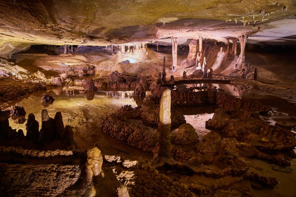 Walk through stunning underground passageways, admire breathtaking rock formations, and explore a natural wonder.