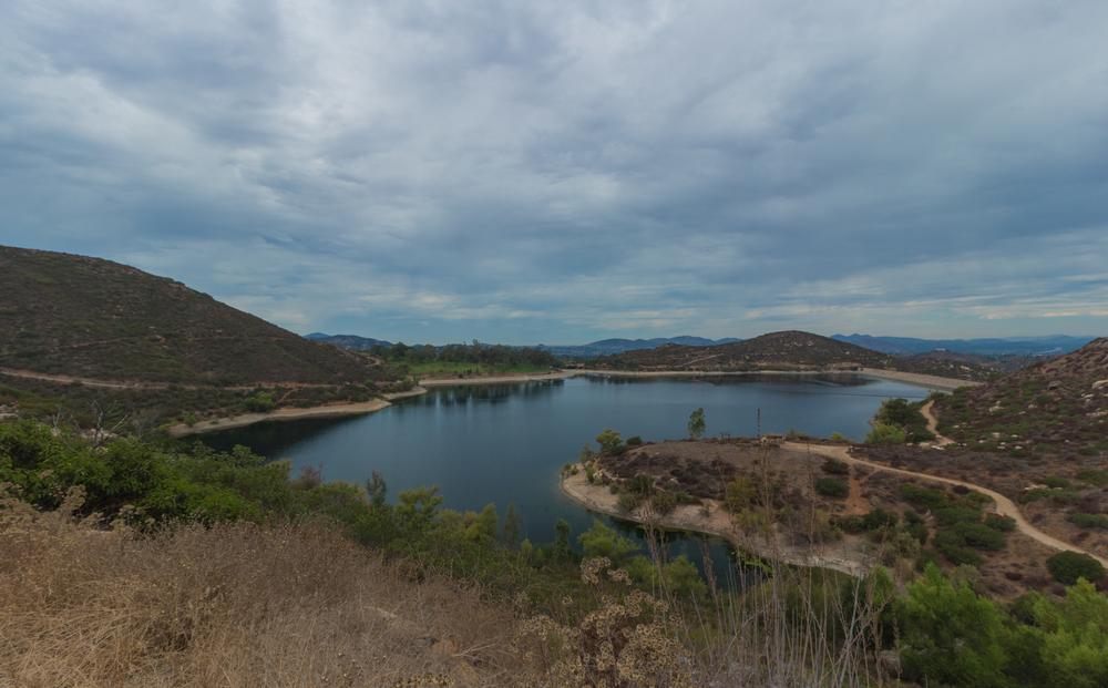 Hike surrounding trails and fish calm waters during spring.
