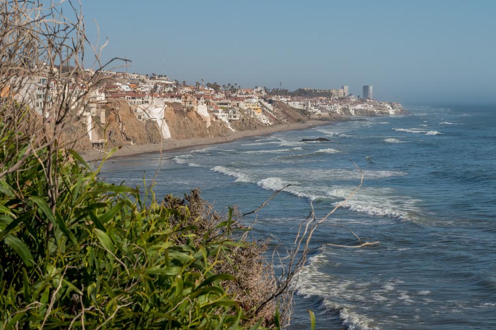 Relax on sandy shores and explore local markets during summer.