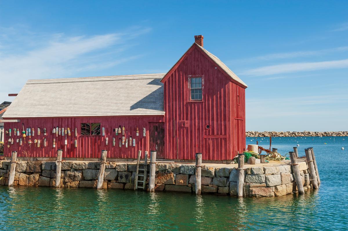 Red fishing shack on Bradley Wharf in the harbor town of Rockport, Massachusetts