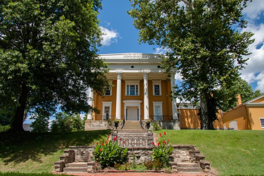 Stroll along a scenic riverfront, admire beautifully preserved mansions, and explore vibrant local shops.
