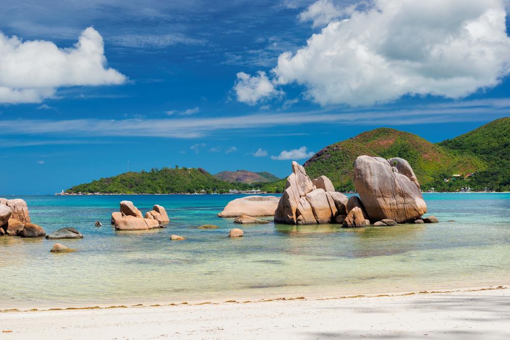 Walk along palm-lined shores or admire granite boulders on an exciting retreat.