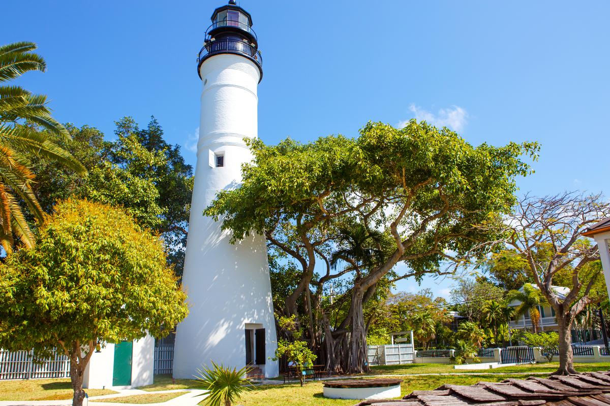 Lighthouse and Duval Street in downtown Key West