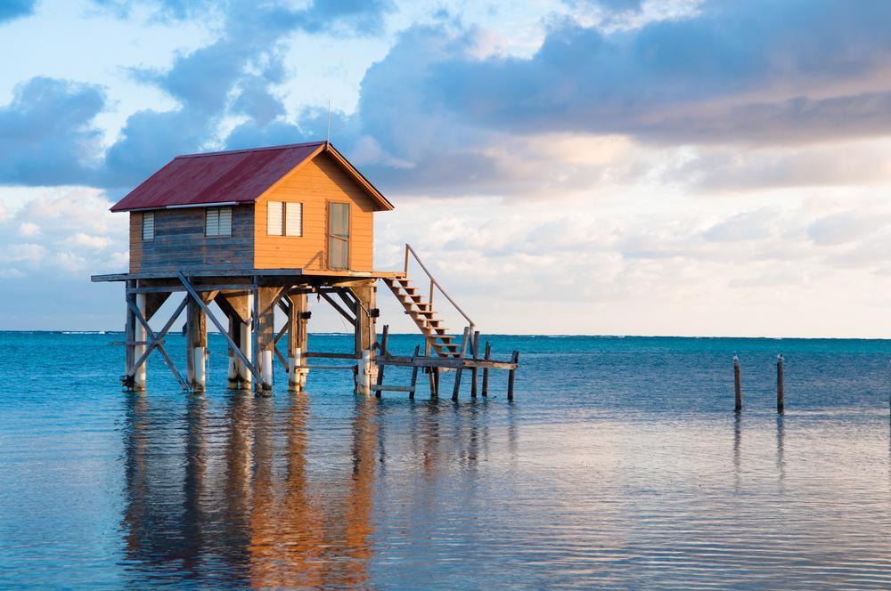 Dive vibrant coral reefs and enjoy island vibes on an affordable Belize getaway.