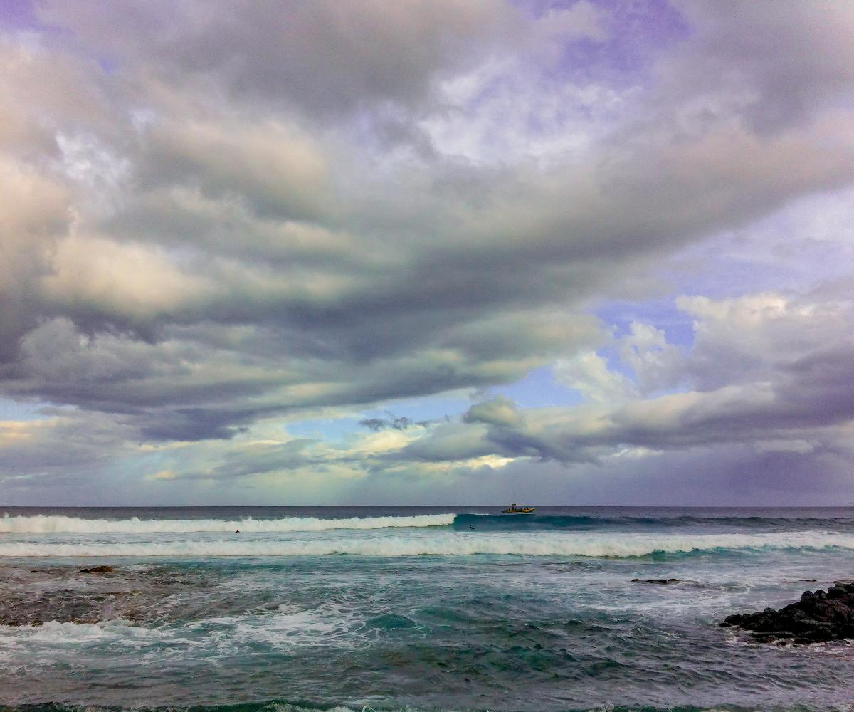 I took this photo of the ocean and dramatic clouds near Kona, Hawaii