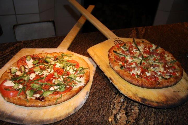 Try wood-fired pizzas and enjoy a family-friendly stop with great energy.