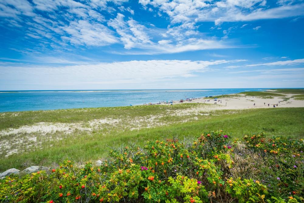 Bike coastal paths and relax on sandy beaches during a breezy summer vacation.
