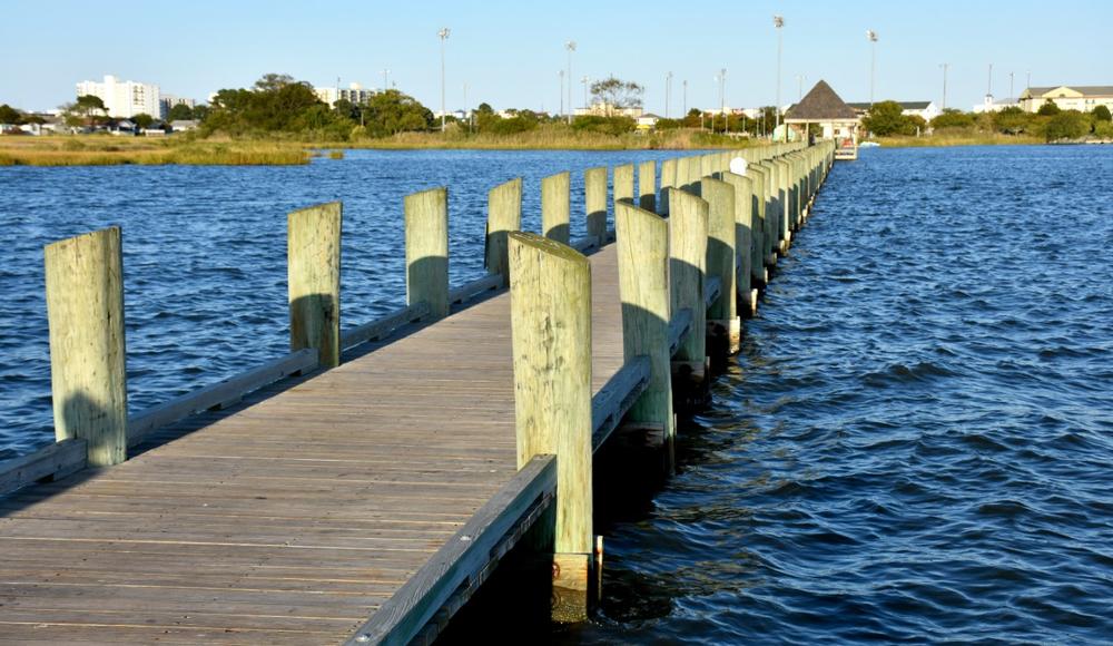 Go on a classic boardwalk adventure with sandy beaches, amusement rides, and fresh seafood.