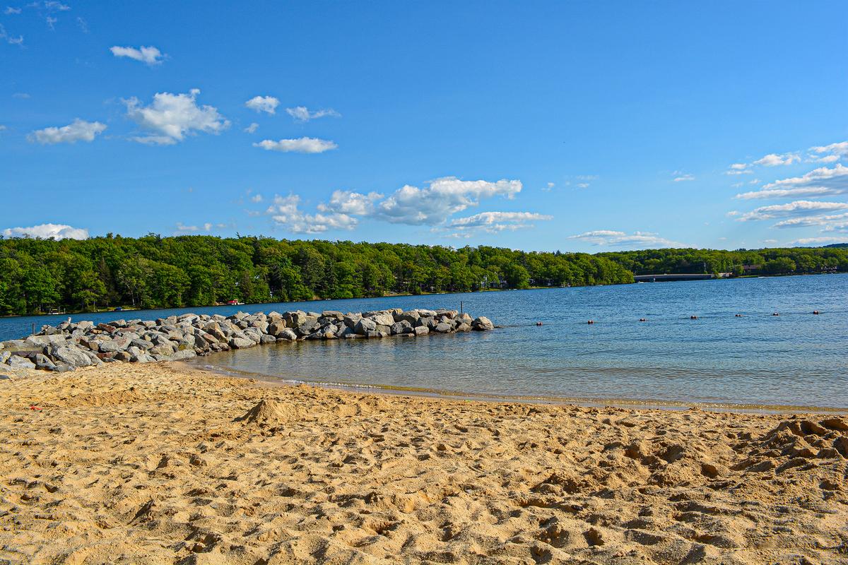 Swim and relax on the sandy lakeshore beach at Deep Creek Lake
