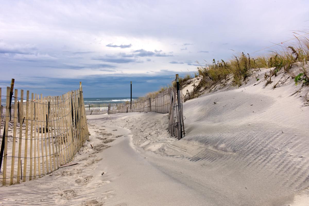 Surf gentle waves and explore lively beachside dining.