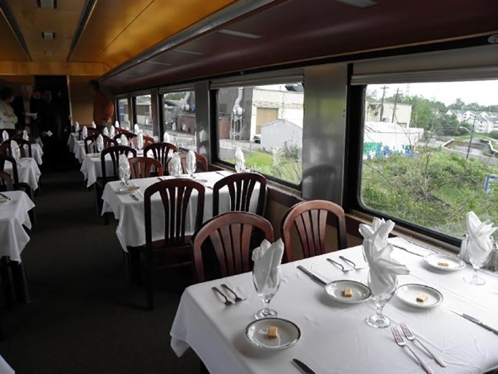 Enjoy a vintage ride and savor a meal on a romantic evening journey.