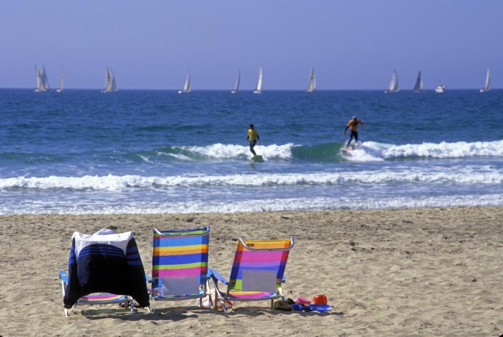 Bike on the boardwalk and admire harbor views on a lively family getaway.