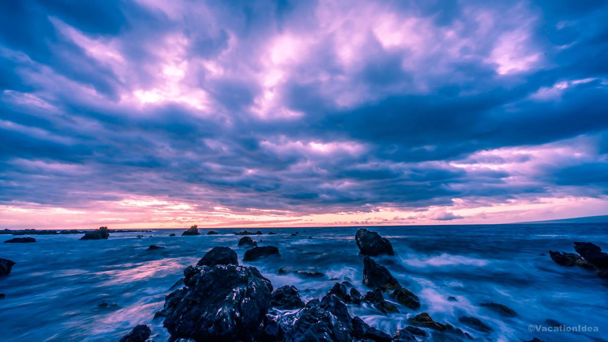 I took this photo of a sunset over the rocks one beautiful evening