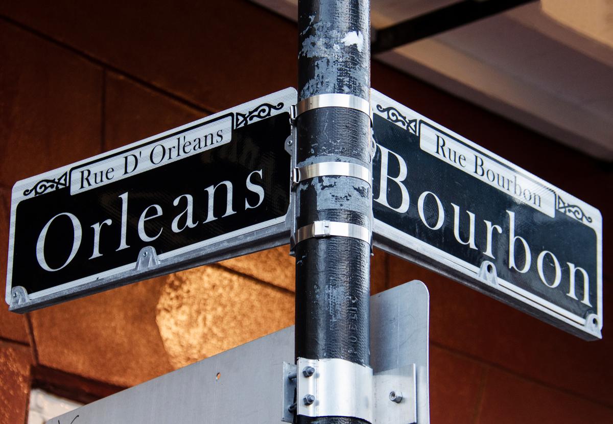 Street signs for Rue D' Orleans and Rue Bourbon