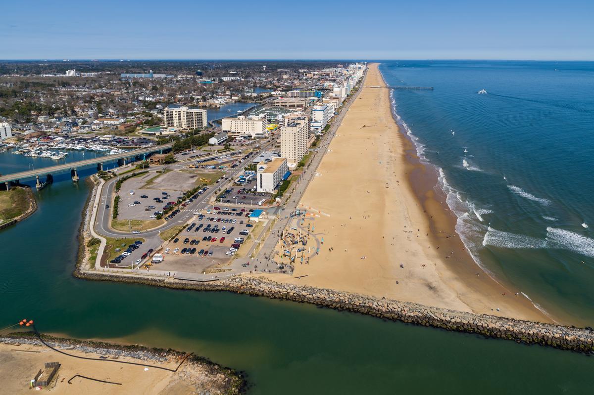Relax on sandy shores and explore boardwalk attractions during a fun, affordable trip.