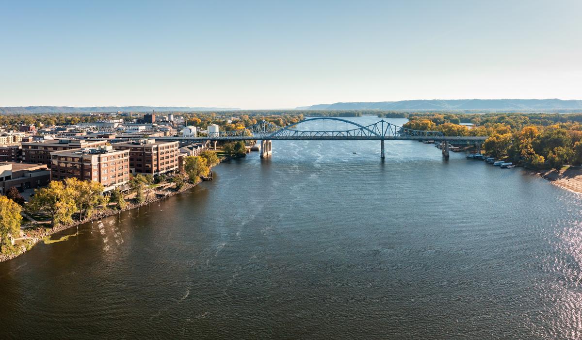 Walk riverfront paths and browse local shops on a peaceful retirement escape.