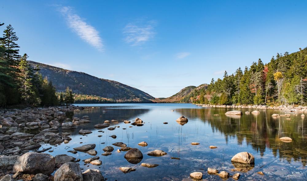 Explore rugged coastlines and hike granite peaks on a scenic fall trip.