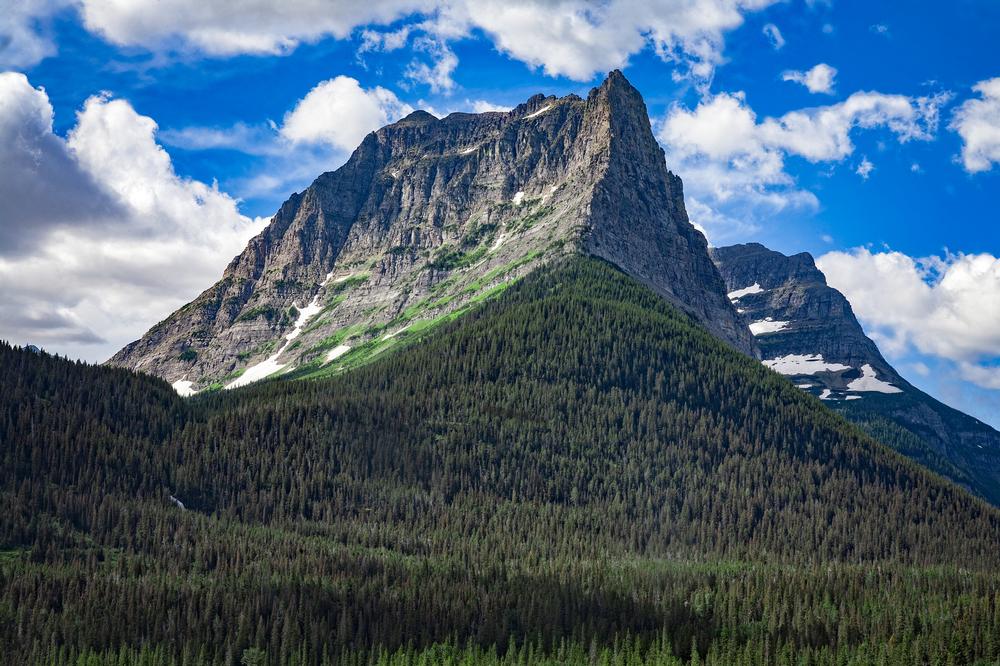 Hike alpine trails and admire dramatic peaks on a breathtaking summer trip.