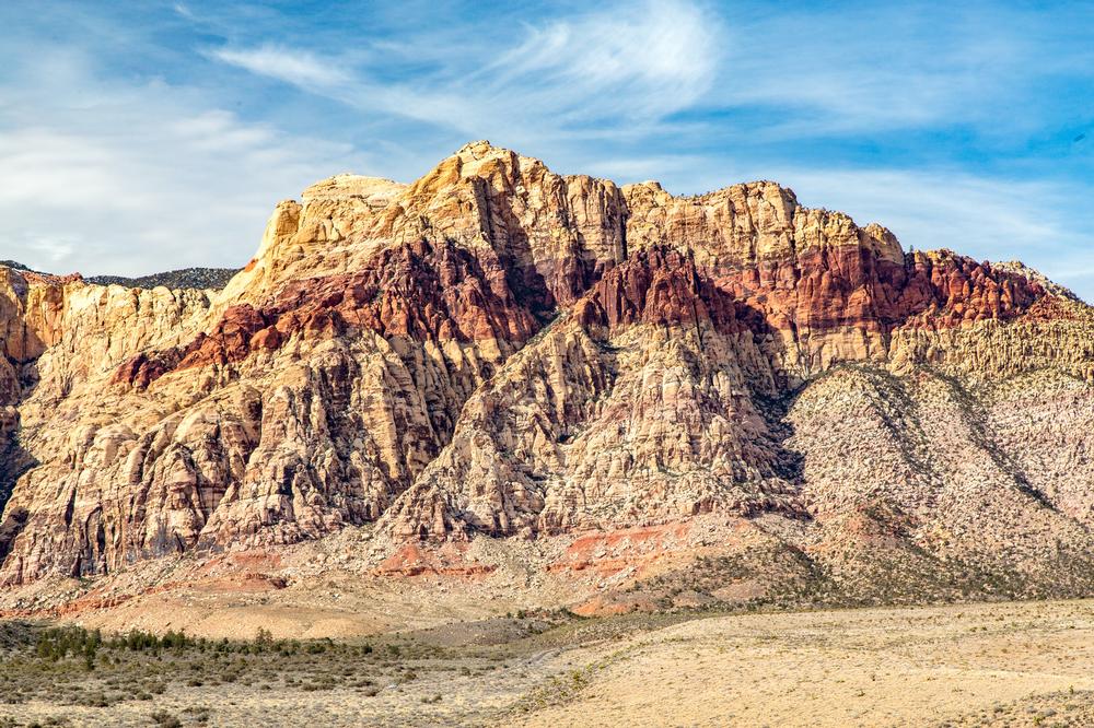 Hike stunning desert trails and admire towering cliffs on an affordable outdoor trip.
