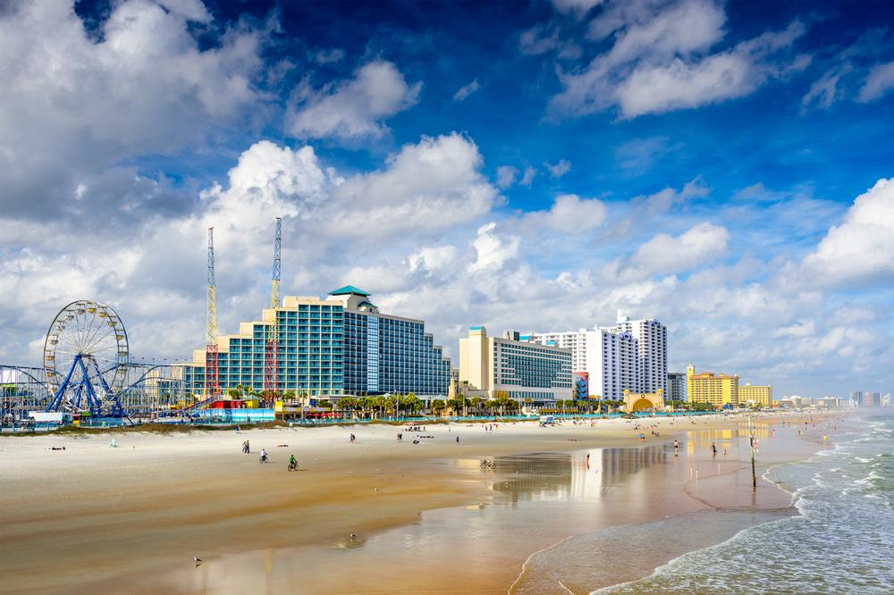 Walk along sandy shores in Daytona Beach